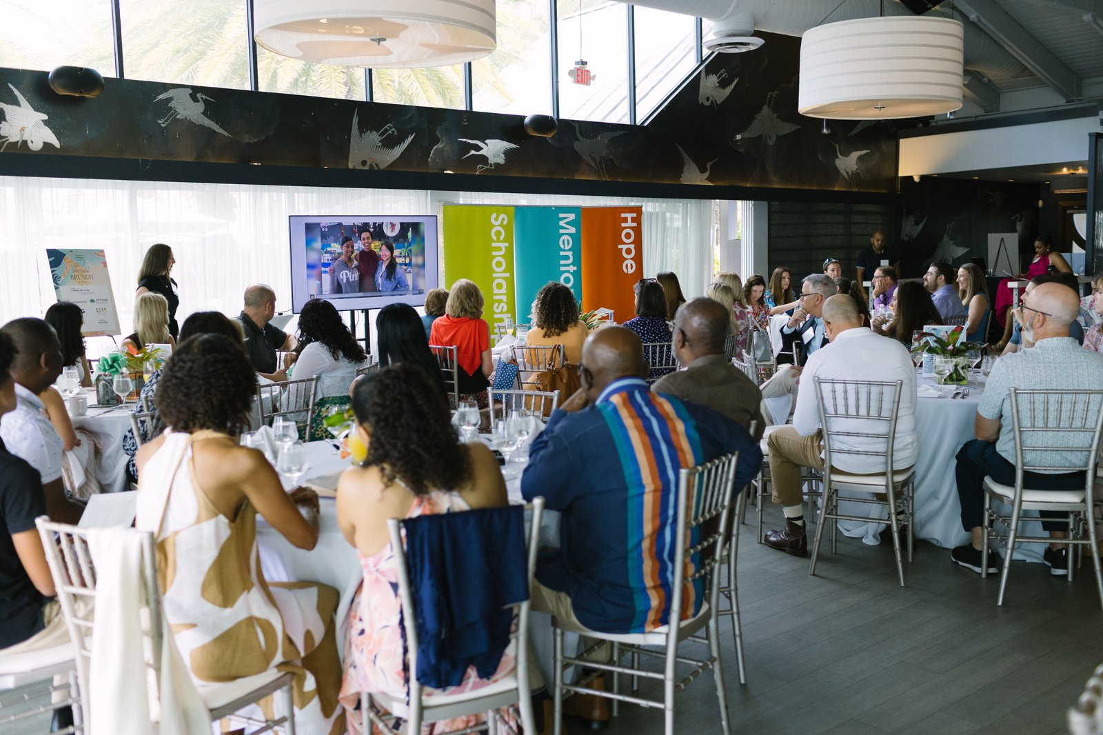 A full dining room of guests at a Take Stock in Children fundraiser